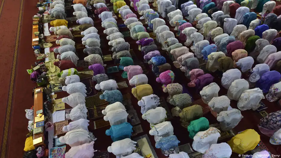Muslims praying in a mosque in Jakarta, Indonesia