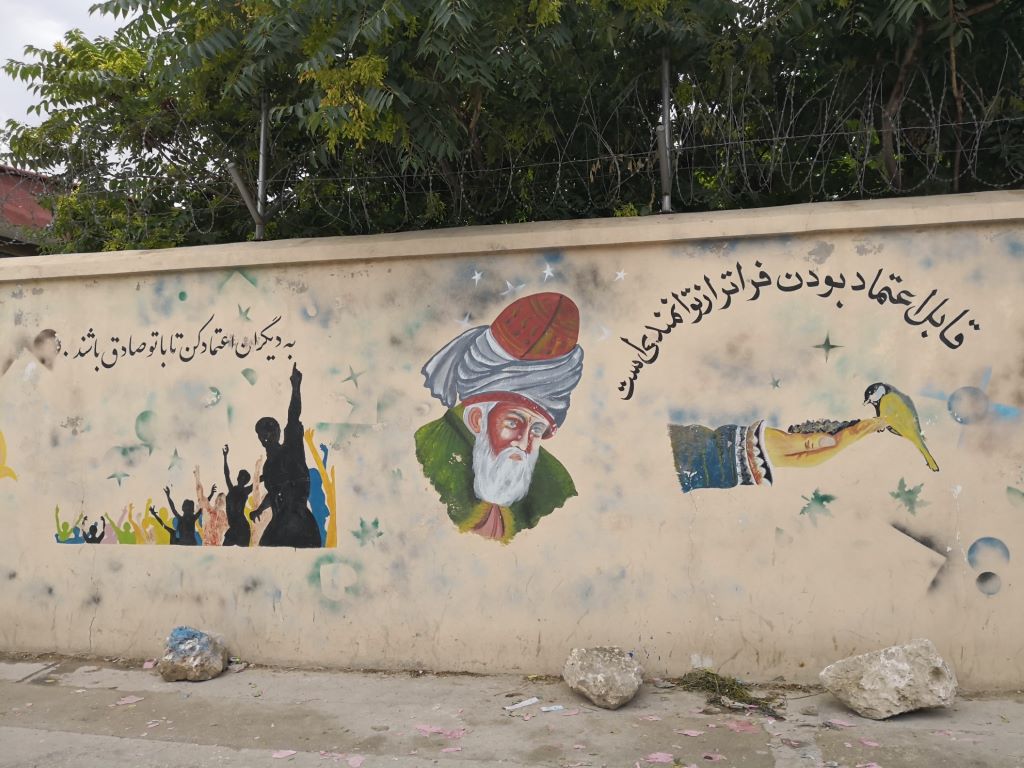 Wandmalerei in Masar-e Scharif mit Konterfei Rumis 