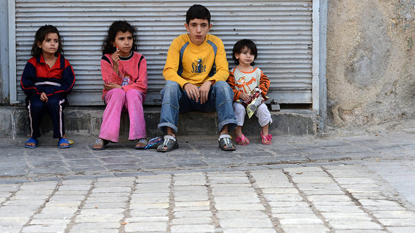 Kinder in Aleppo; Foto: AFP