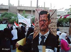 Demonstration gegen das Regime in einem Vorort von Damaskus; Foto: dapd