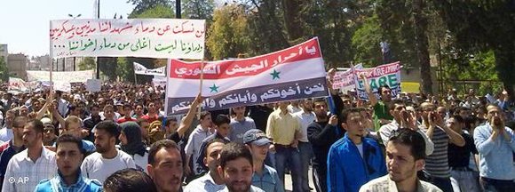 Demonstartion gegen das Assad-Regime in Homs; Foto: AP