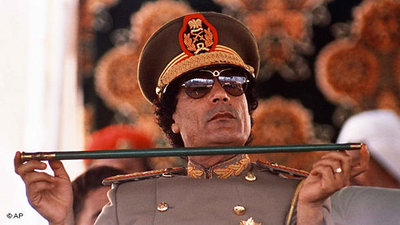Muammar al-Gaddafi wearing a military uniform (photo: AP)