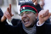 A man protests against the regime in Libya (photo: AP)