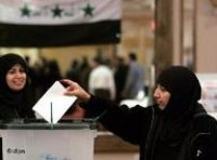 A veiled Girl at the ballot box in Baghdad, Iraq (photo: dpa)