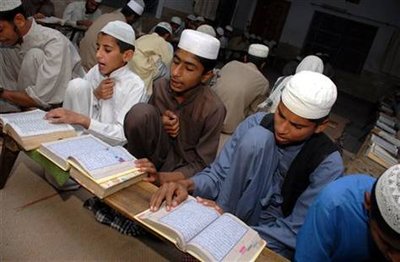 Students reading the Koran in a Punjabi madrasa, Pakistan (photo: AP)