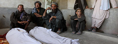 The bodies of some of the people killed during an attack on a wedding ceremony in Kandahar in June 2010 (photo: AP)