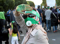 Pro-Mousavi demonstrator in Tehran (photo: AP)