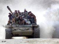 Taliban fighters on a tank in Northern Afghanistan (photo: AP)