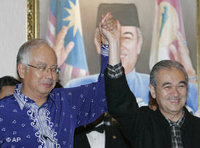 Defence Minister Najib Razak (left) and Prime Minister Badawi (right) (photo: AP)