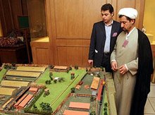 An Islamic cleric and an aide during the holocaust conference in Tehran, Iran, at a model of the Nazi concentration camp Treblinka (photo: AP)