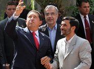 Venezuela's President Hugo Chavez, left, gestures as he talks with Iranian President Mahmoud Ahmadinejad, right, before an official welcoming ceremony for Chavez in Tehran, Iran, 29 July 2006 (photo: AP)