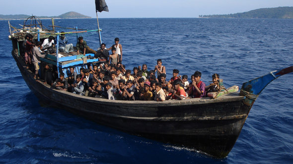 A powerless or engineless boat loaded with Rohingya refugees, moments before it was rescued by Indian Coastguards off Andaman Islands. Thai authorities forced the boatpeople board this boat which was then towed out to the middle of the sea and left to drift with very little food and water (photo: Asiapics)