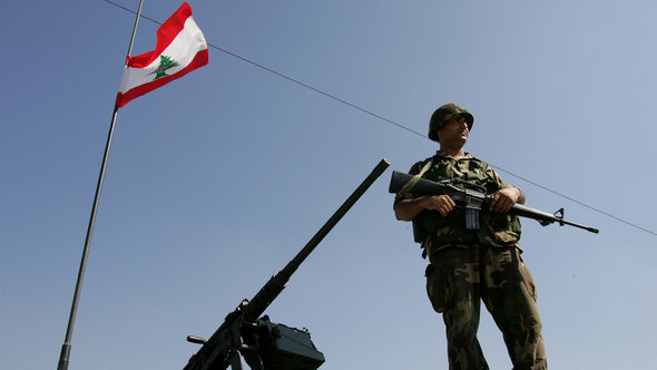Ein Soldat an einem Grenzposten zwischen Syrien und dem Libanon, Foto:AP 