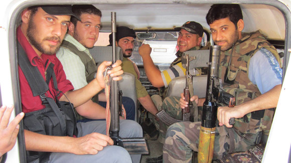 Mitglieder der Freien Syrischen Armee in Homs im Juli 2012; Foto: Reuters