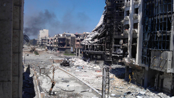 Zerstörte Straüßenzüge in Homs im April 2012, Foto: Reuters
