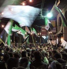 Nächtlicher Protest gegen Assad in Damaskus, April 2012; Foto: AP/dapd