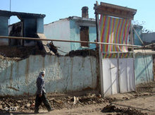 Zerstörungen nach den Unruhen in Osch; Foto: DW