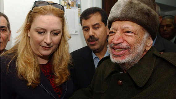 ياسر عرفات وزوجته سهى في رام الله 2004. إ ب أ