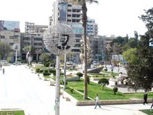 Platz in Aleppo mit Portrait des Präsidenten Bashar Al-Assad; Foto: Susanne Schanda