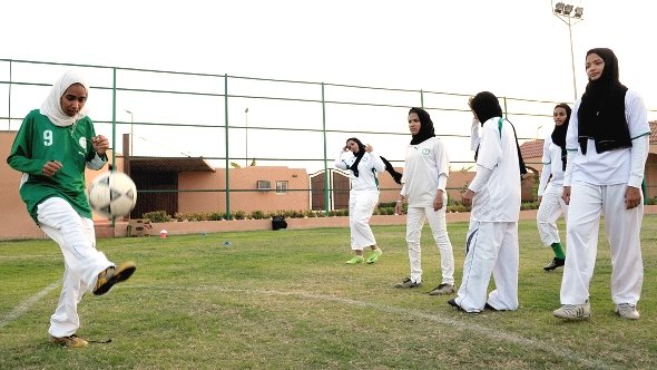 Saudi members of the King's United women football club train at a stadium in the Red sea port of Jeddah on May 20,2009, despite strict religious taboos in the desert kingdom (photo:  Omar Salem/AFP/Getty Images)