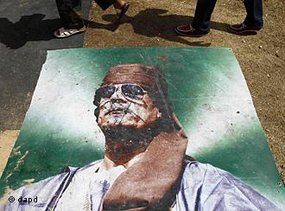 Battered poster of Gaddafi on the streets of Tripoli (photo: dapd)