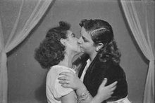 Two women kissing (photo: Arab Image Foundation)