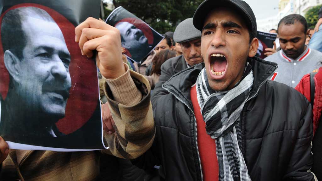 Protests in Tunis following the assassination of Chokri Belaid (photo: AFP/Getty Images)