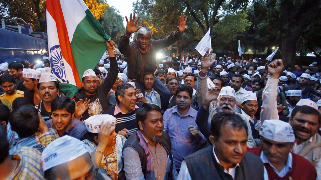 Supporters of the AAP shout slogans during a protest outside the headquarters of the BJP in New Delhi on 5 March 2014 (photo: Reuters/UNI)
