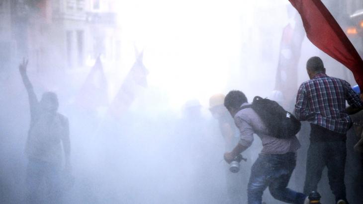 Clashes between police and Erdogan opponents in Istiklal Avenue in Istanbul (photo: BULENT KILIC/AFP/Getty Images)