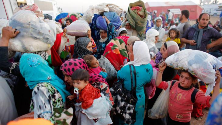 Syrische Flüchtlinge an der Grenze zur Türkei; Foto: Reuters/Murad Sez
