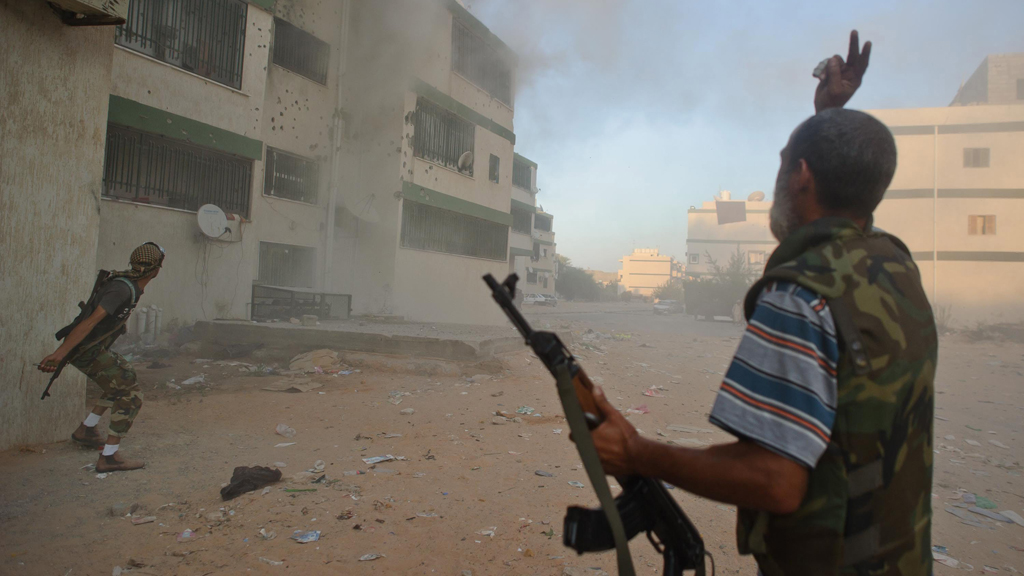 Libysche Rebellen in Abou Selim; Foto: picture-alliance/dpa/C. Petit Tesson