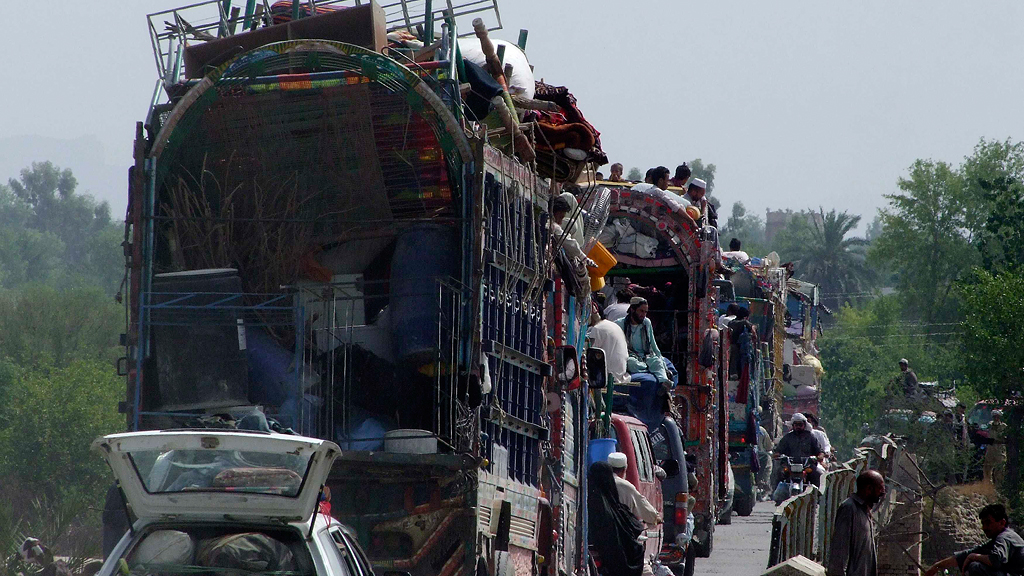 People fleeing the military offensive against Pakistani militants in North Waziristan, June 2014 (photo: Reuters)
