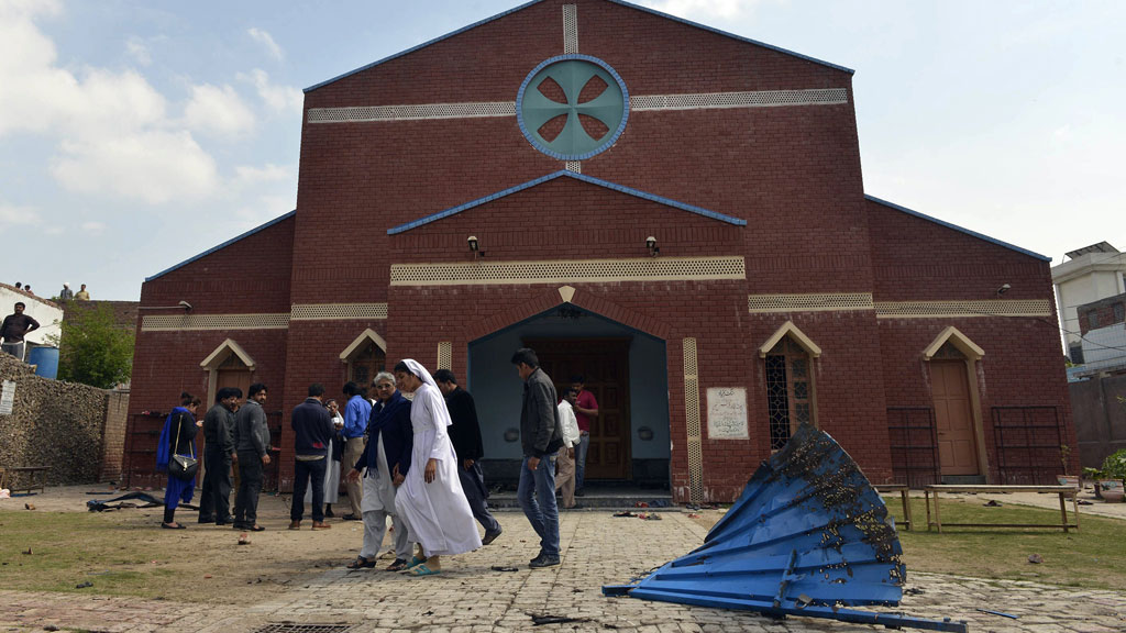 Pakistani Christians gather in front of a church following suicide bombing attacks on churches in Lahore on 15 March 2015 (photo: AFP/Getty Images/A. Ali)