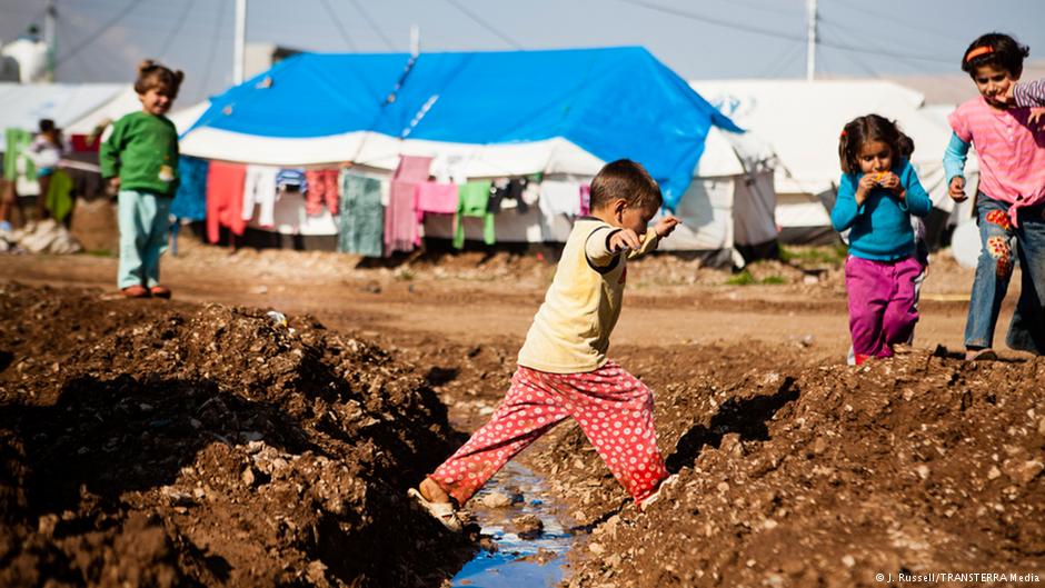 Refugee children playing in a refugee camp (photo: Jacob Russell/TRANSTERRA media)