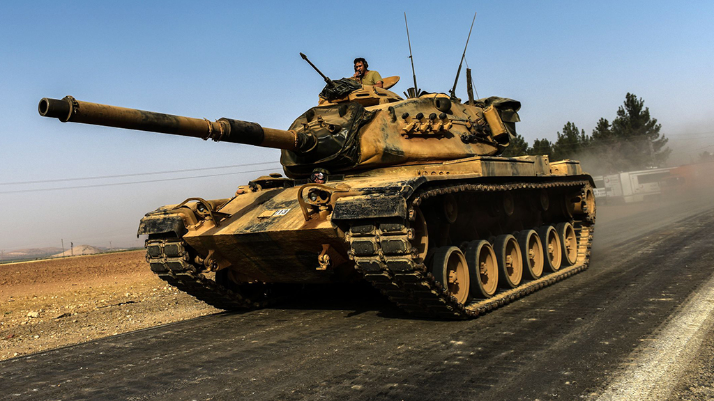 Türkischer Panzer an der Grenze zu Syrien; Foto: Getty Images/AFP/B. Kilic