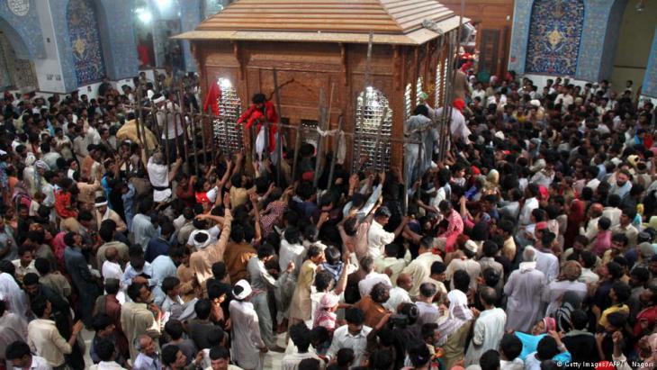 Sufis dancing at the Lal Shahbaz Qalandar shrine (photo: AFP/Getty Images)