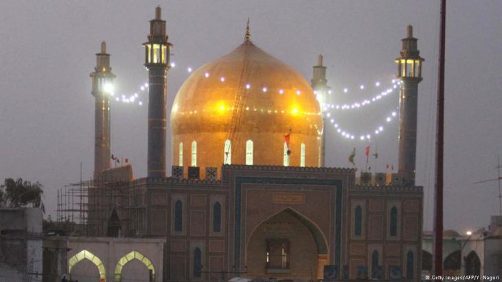 Lal Shahbaz Qalandar shrine at night (photo: Getty Images/AFP)