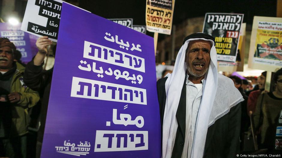 Arabs and Israelis participate in a demonstration on 4 February 2017 against Prime Minister Benjamin Netanyahu and against the home demolition policy in Tel Aviv 