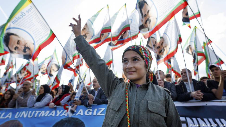 Participants wave banners at the 25th International Kurdish Culture Festival, held in September 2017 in Cologne, Germany (photo: Imago/Future image/C. Hardt)