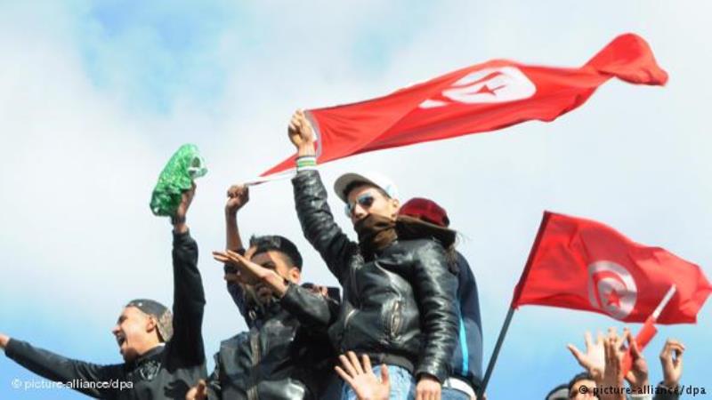 Tunesische Demonstranten protestieren gegen das Ben-Ali-Regime in Tunis; Foto: dpa/picture-alliance