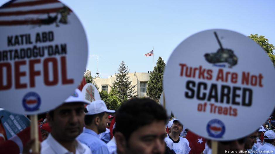Read "Threats!": members of Turkish civil servants' union - Memur Sen - protest against U.S. sanctions imposed against Turkey's interior and justice ministers