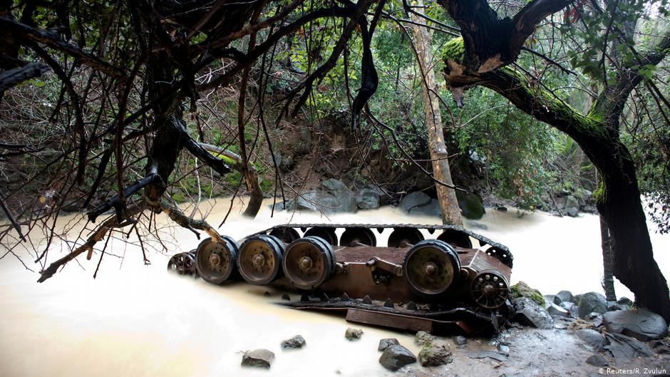 An overturned Syrian tank lies in the Hermon Stream in the Banias Nature Reserve on the western edge of the Israeli-occupied Golan Heights (photo: Reuters/R. Zvulun)