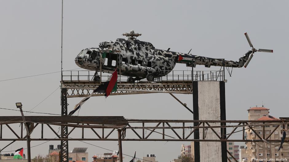 The broken helicopter of the late Palestinian Authority President Yasser Arafat sits atop a structure in Gaza City. (photo: Reuters/I. Abu Mustafa)