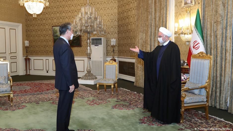 Chinese Foreign Minister Wang Yi (left) and Iranian President Hassan Rouhani, Tehran, March 2021 (photo: Presidential Website/Reuters)