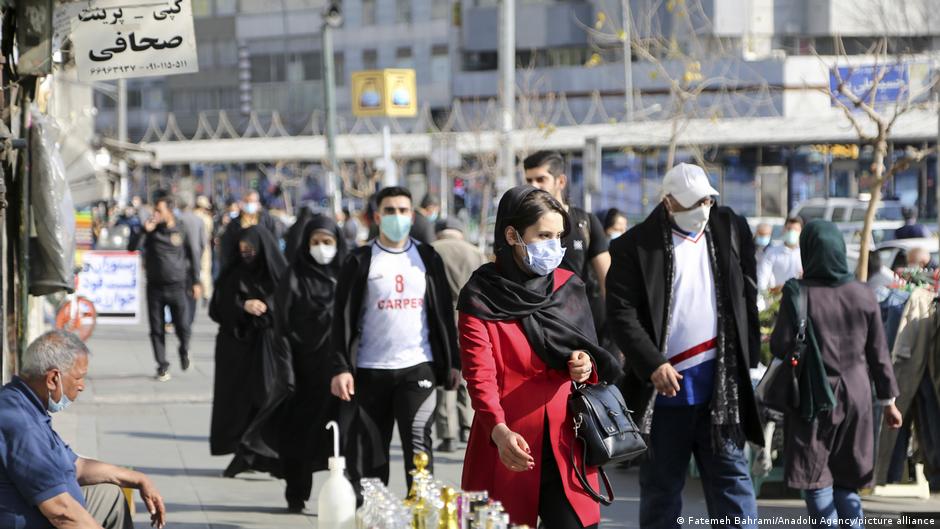 People walking along a street in Tehran, 16 February 2021 (photo: Fatemeh Bahrami/Anadolu Agency) 
