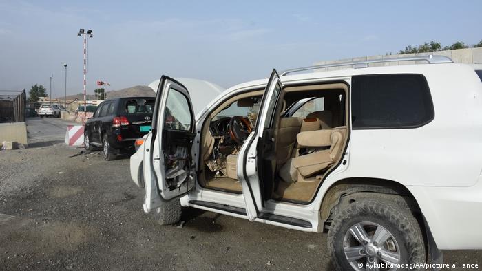 Wrecked cars abandoned in front of Kabul airport