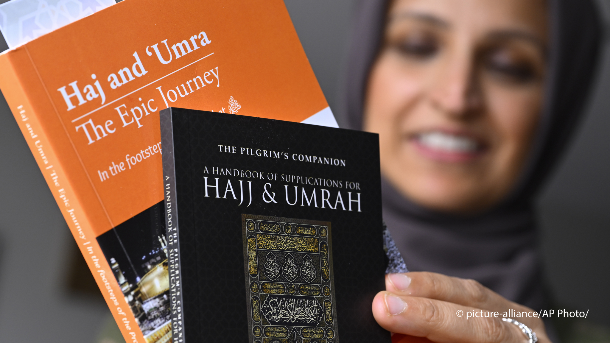 Muslim family member Saadiha Khaliq holds material which she read in preparing for her upcoming trip to hajj, pictured Wednesday, June. 7, 2023, in Murfreesboro, Tenn. The Khaliq family are planning to travel together to Mecca in Saudi Arabia for hajj, the pilgrimage which every adult Muslim who can afford it and is physically able, must make at least once in his or her lifetime. The hajj is the fifth of the fundamental Muslim practices and institutions known as the Five Pillars of Islam (image: AP Photo/Jo