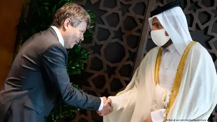Robert Habeck, German minister for economic affairs and climate action (left), shakes hands with Sheikh Mohammed bin Hamad bin Qassim Al Abdullah Al Thani, Qatari minister of commerce and industry at a meeting in March 2022