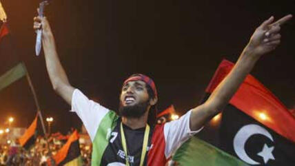 People celebrating in Tripoli (photo: AP)