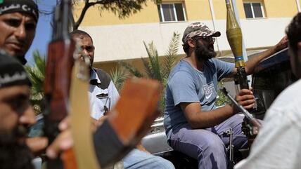 Rebels in Tripoli (photo: picture-alliance/dpa)